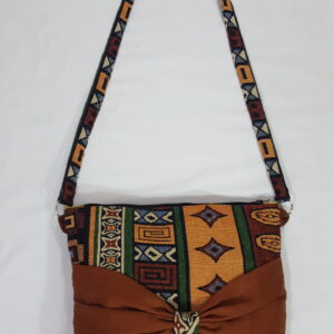 20221130_142549 Abstract Multicolored Vertical African Print Bag With Big Stylish Brown Bow