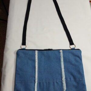 20240128_165658 A Soft Blue Denim single strap bag with double vertical fringed style lines